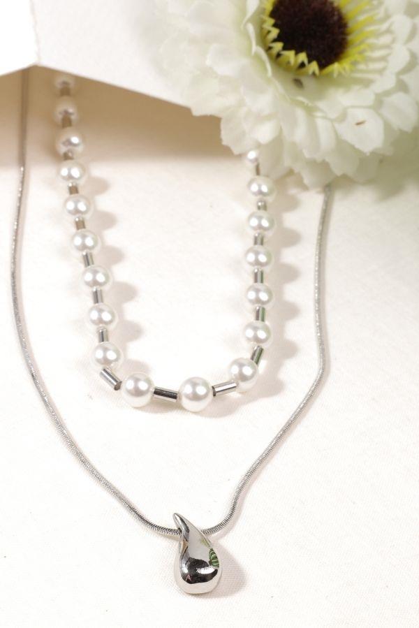 Collier double avec détail de perle en goutte