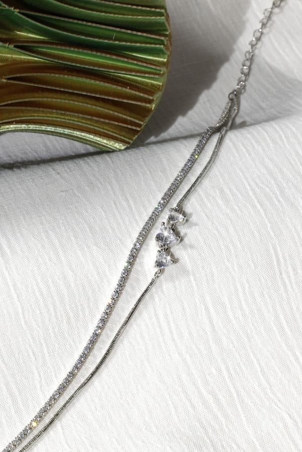 Bracelet double canal avec détail de cœur de la série Trend