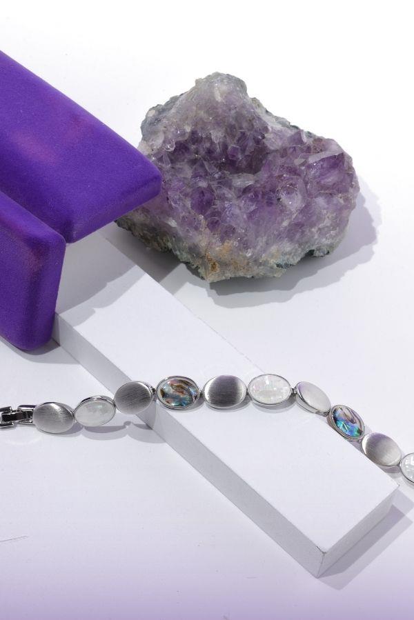 Bracelet en argent sur mesure orné de pierres colorées