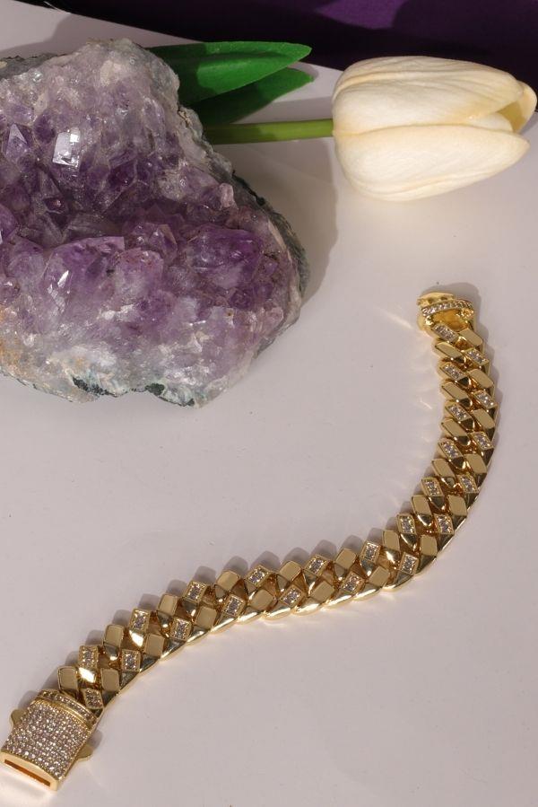 Bracelet gourmet orné de pierres dorées scintillantes