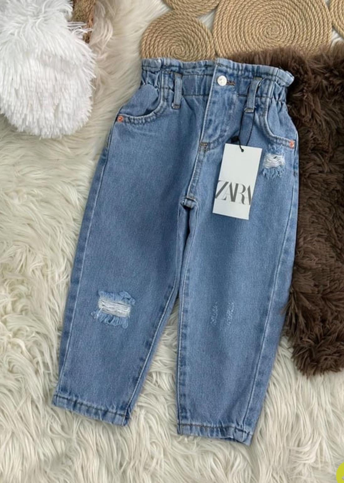 Tek düğme yüksek bel yırtık jean 