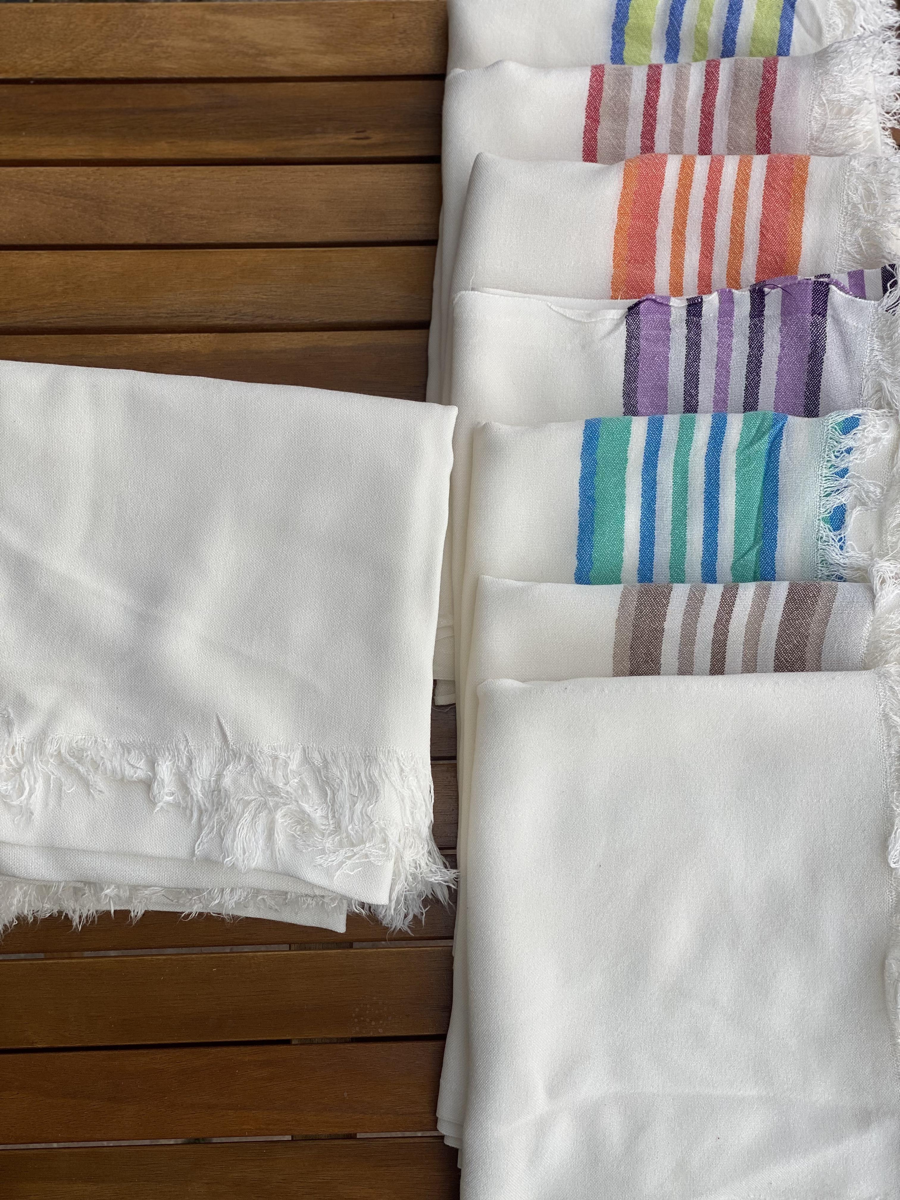 White fabric shawlShawl / Scarf