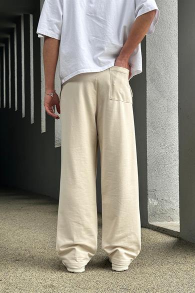 Krem Paçası Yırtmaçlı Nakış Detaylı EE Baggy Eşofman