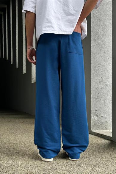 Mavi Paçası Yırtmaçlı Nakış Detaylı EE Baggy Eşofman