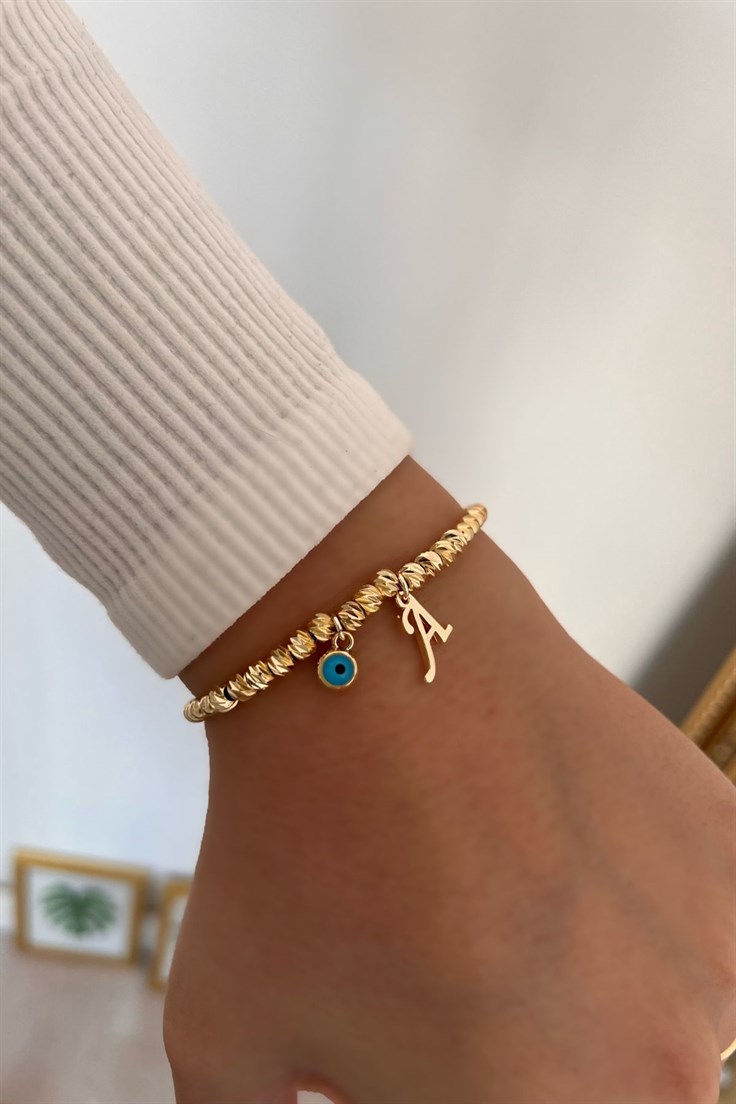 A Harf ve Nazar Sallantılı Dorika Bileklik Gold