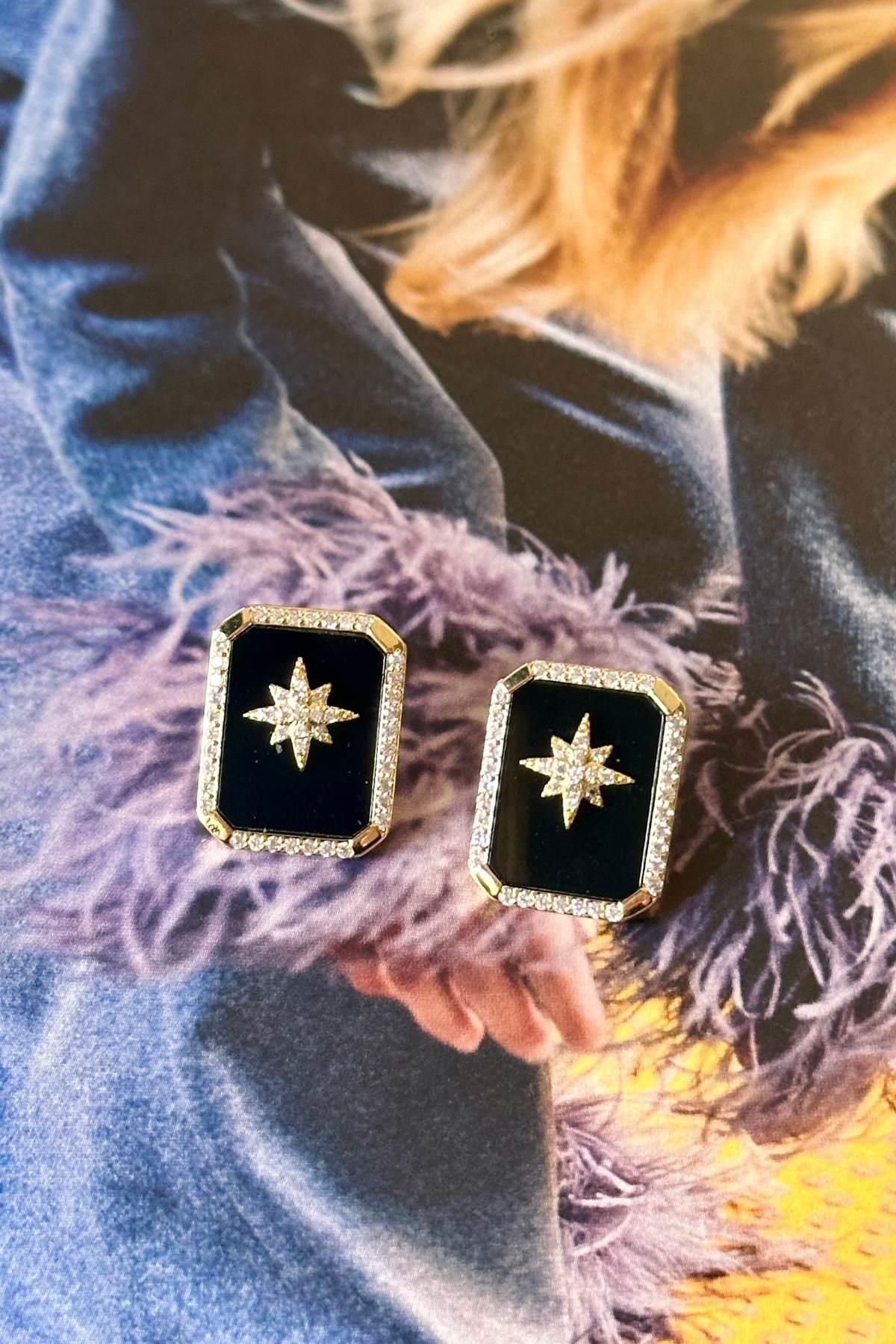 Çelik Kutup Detaylı Mineli Küpe