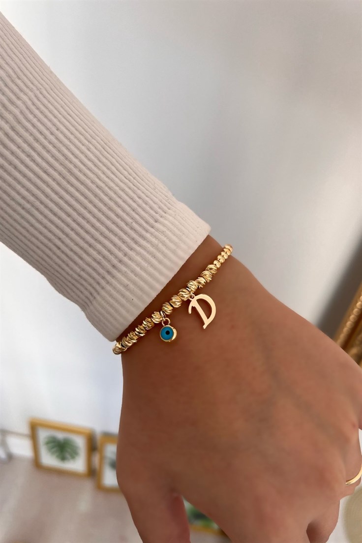 D Harf ve Nazar Sallantılı Dorika Bileklik Gold