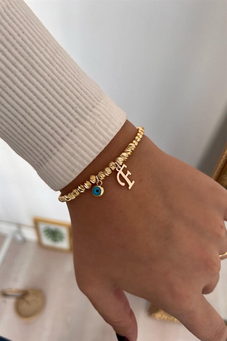 F Harf ve Nazar Sallantılı Dorika Bileklik Gold