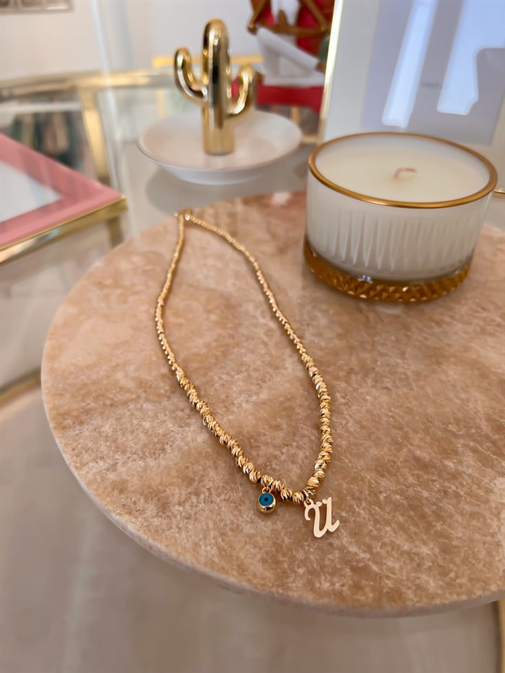 Ü Harfli ve Nazar Detaylı Dorika Kolye Gold