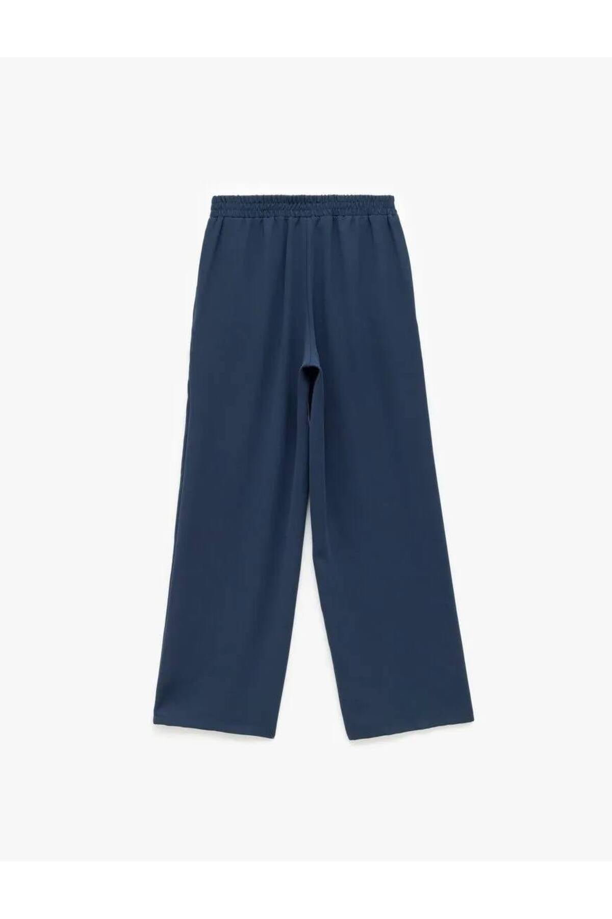 Krep Kumaş Beli Lastikli Düz Bol Paça Pantolon