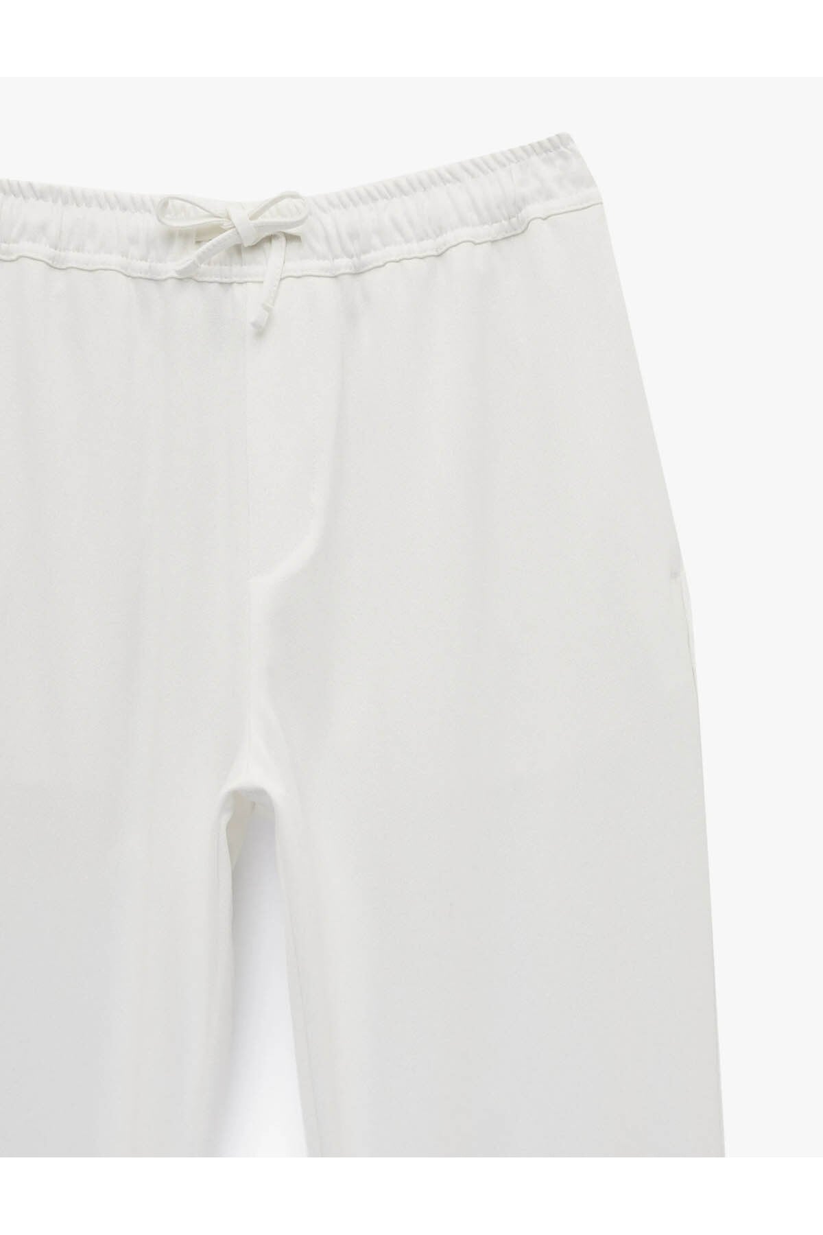 Regular Fit Cepli Beli Bağcıklı Kumaş Pantolon