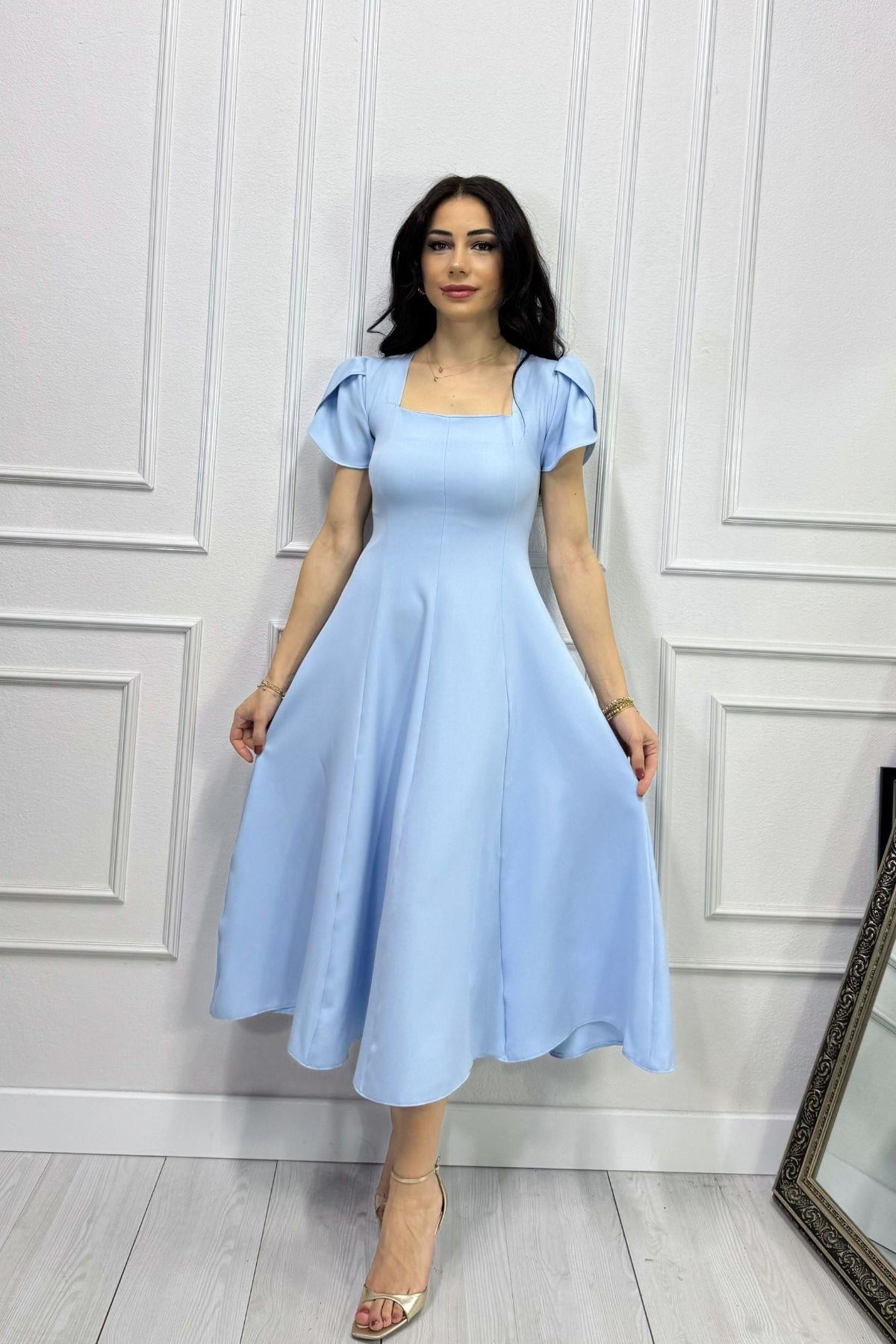 Bebe Mavisi Kol Detaylı Parçalı Kloş Elbise