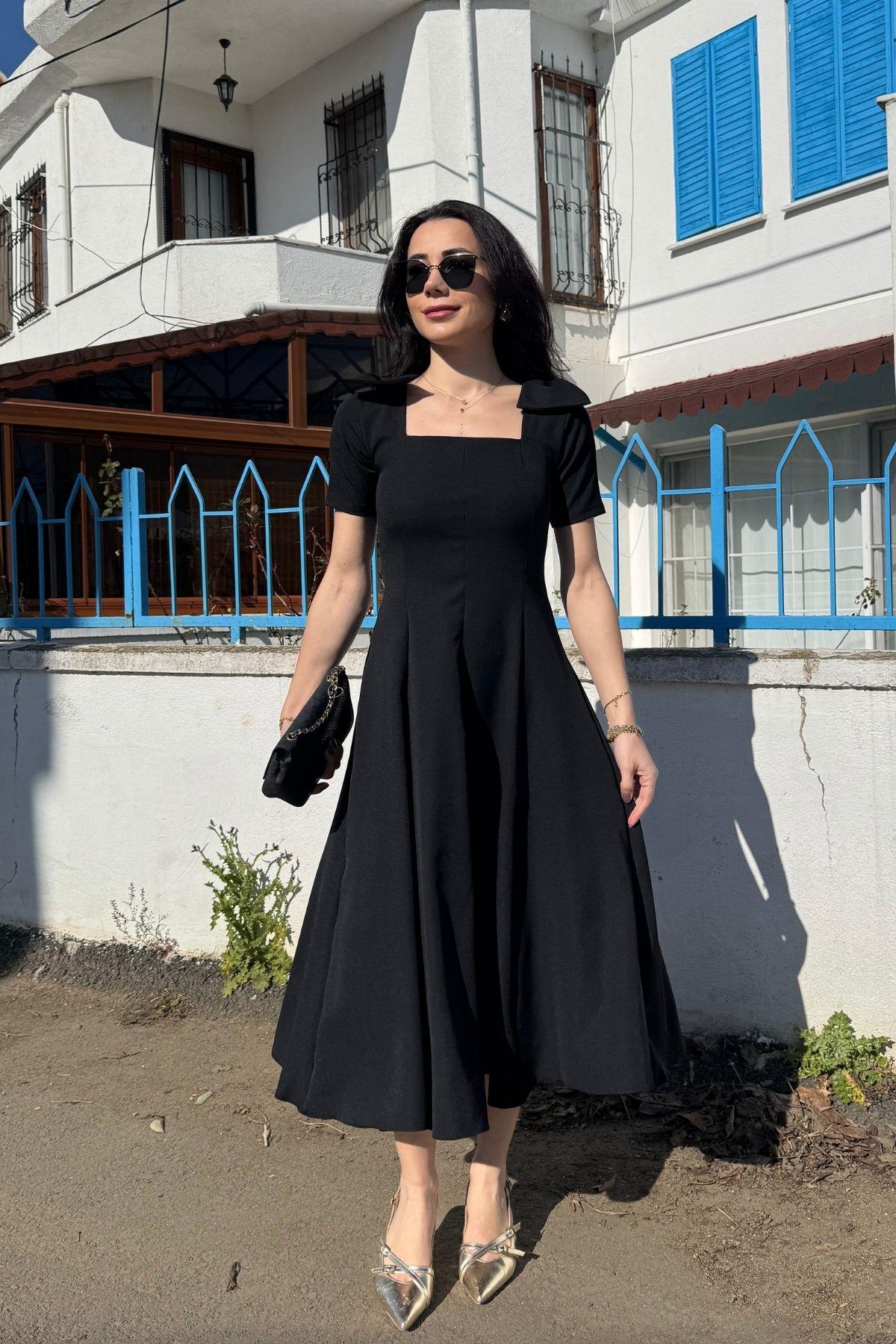 Siyah Omzu Fiyonk Detay Kloş Elbise