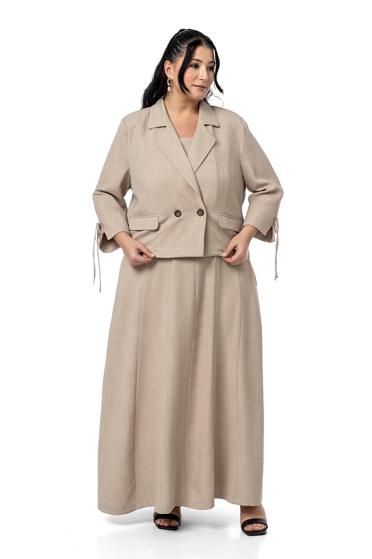 Büyük Beden Sırtı Gipeli Yanlarda Cepli Kolsuz Uzun Bej Rengi Elbise  