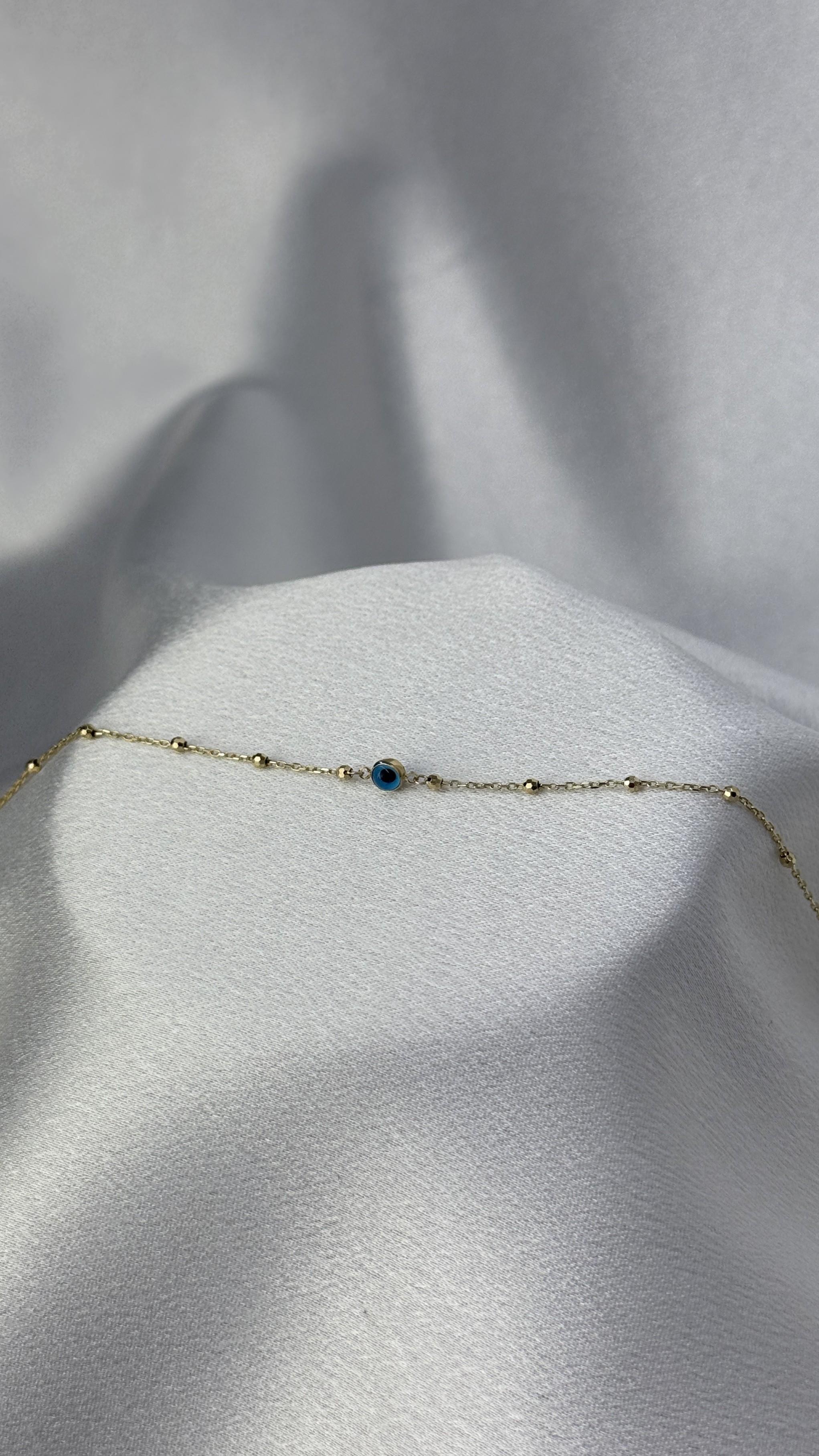 Nazar Boncuğu Figürlü Dorika Toplu Altın Bileklik