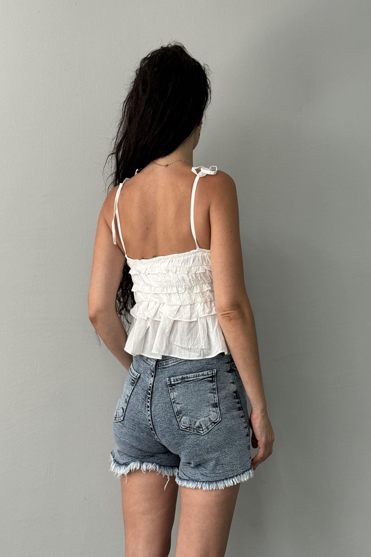 ASKILI GÜL DETAYLI BLUZ