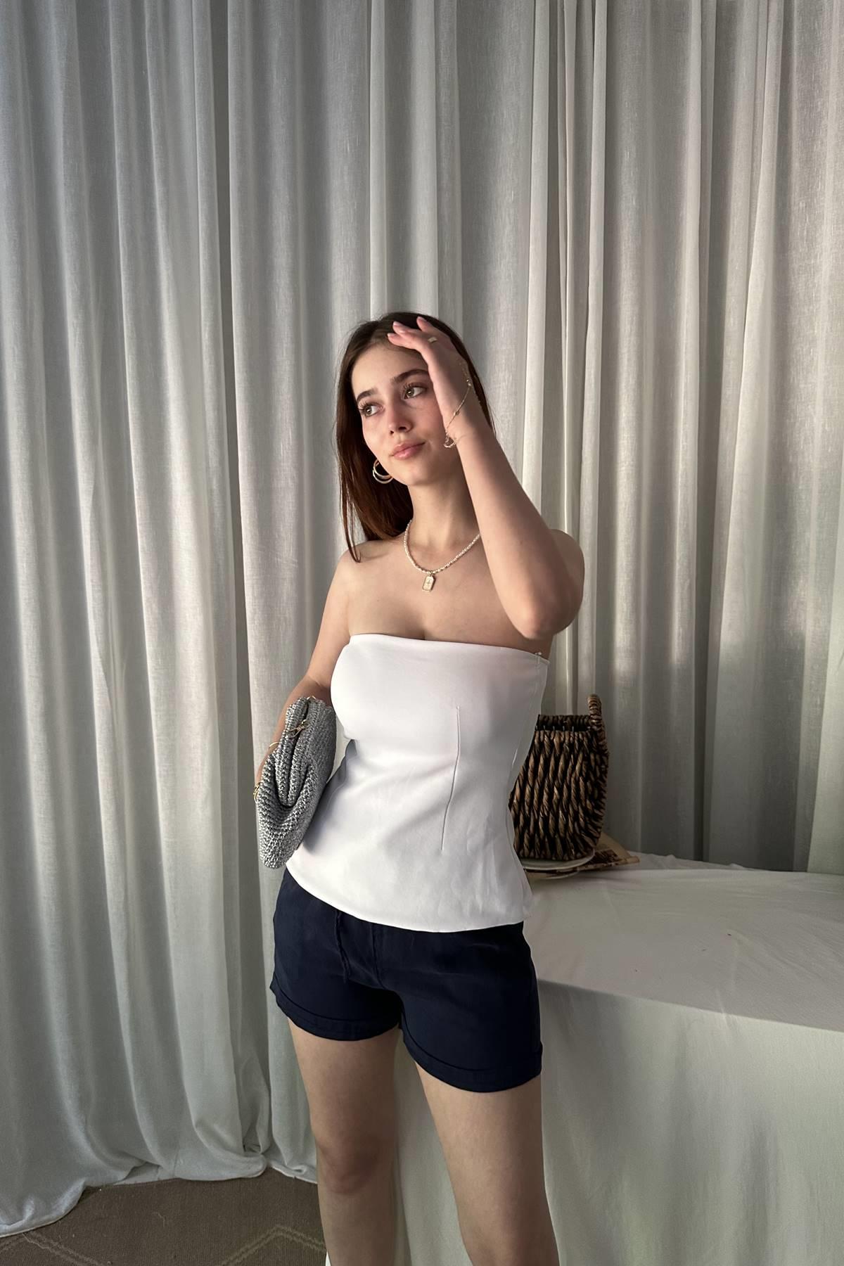 STRAPLEZ PEPLUM TOP