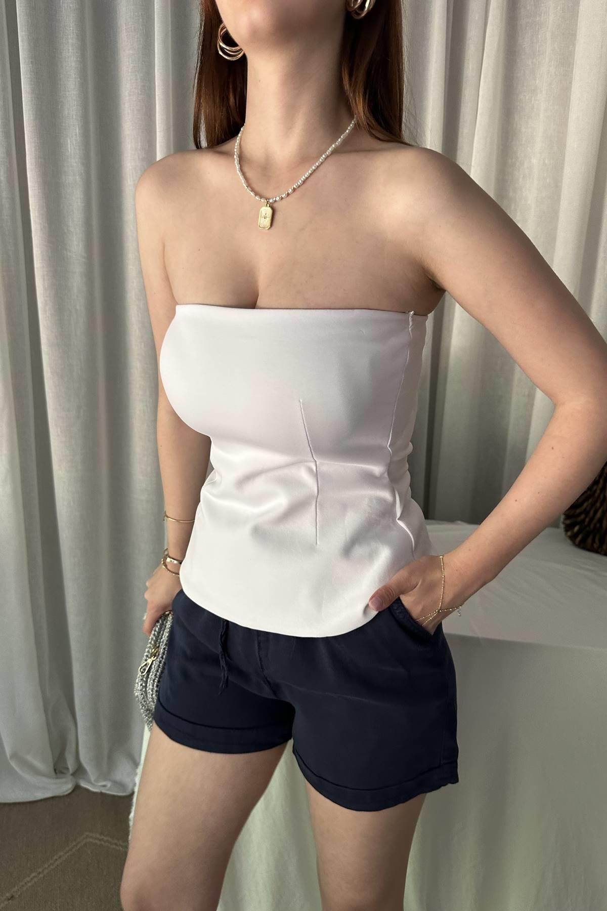 STRAPLEZ PEPLUM TOP