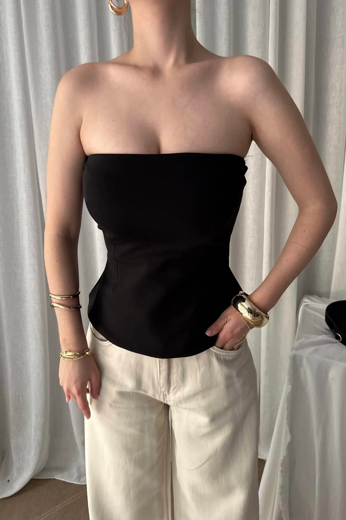 STRAPLEZ PEPLUM TOP