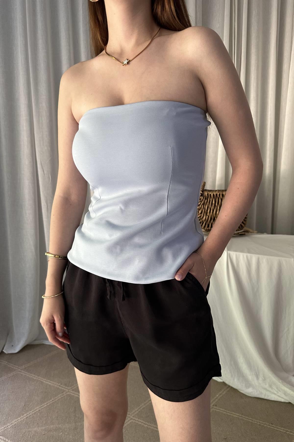 STRAPLEZ PEPLUM TOP