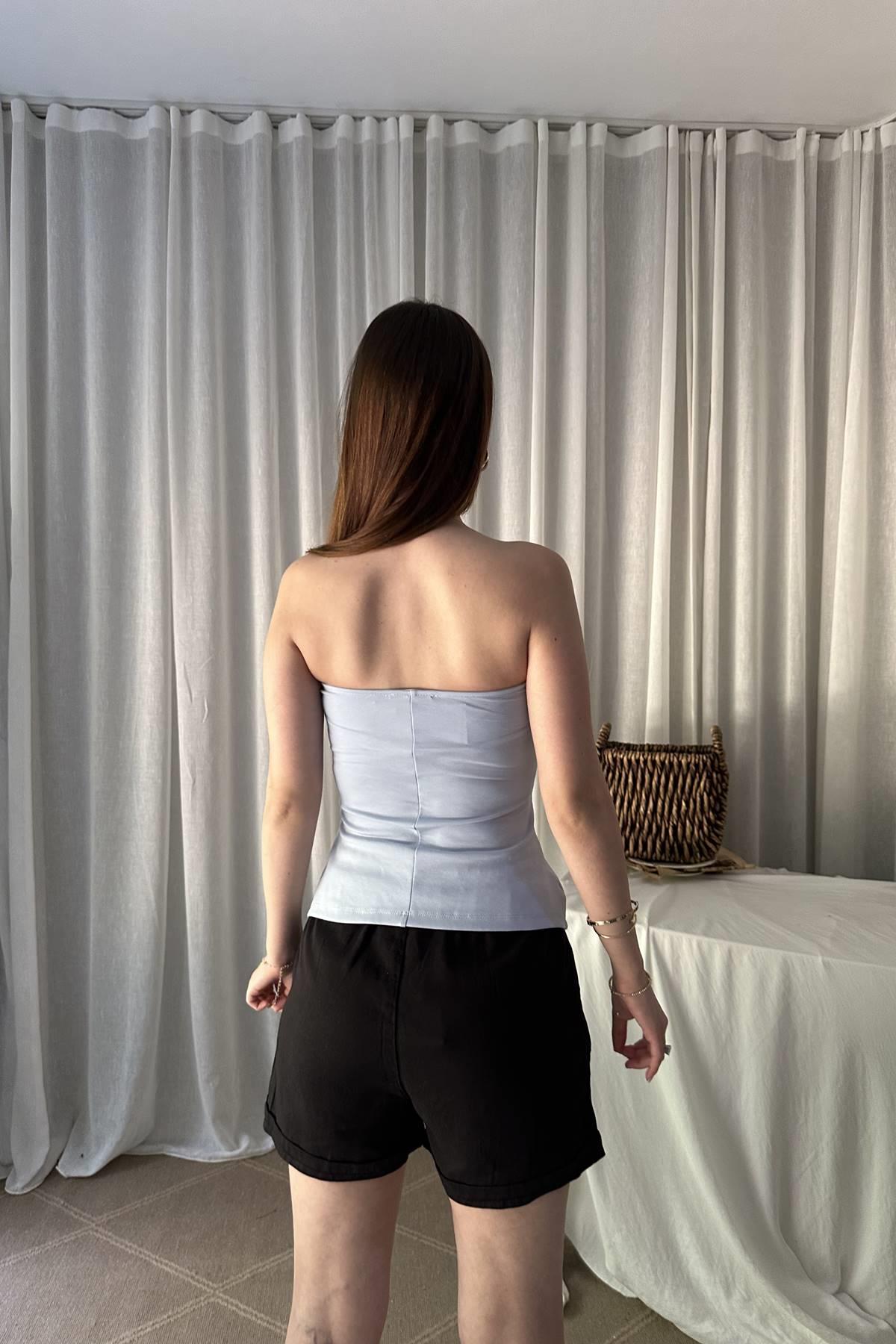 STRAPLEZ PEPLUM TOP