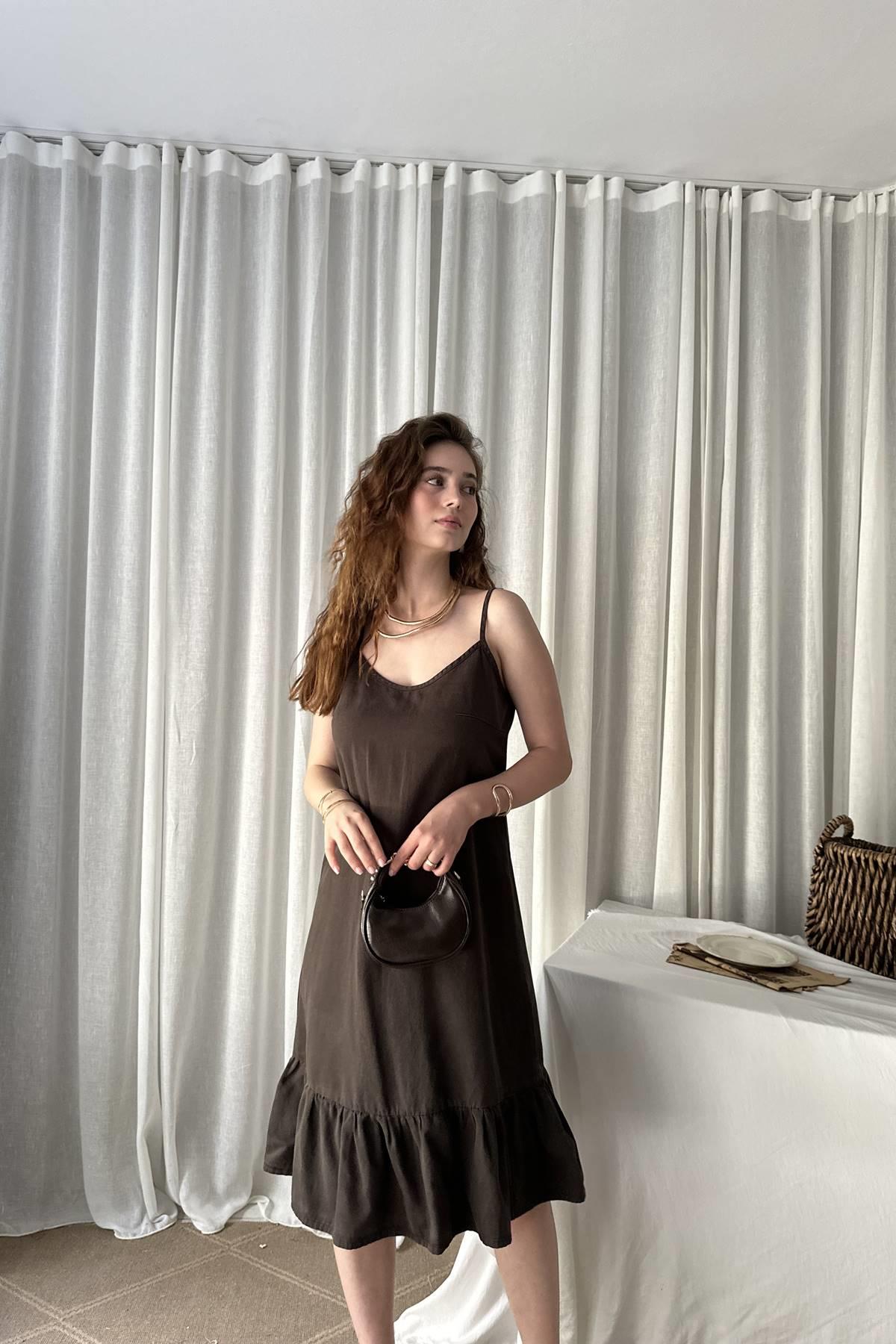 ALT BÖLÜMÜ BÜZGÜLÜ MİDİ ELBİSE