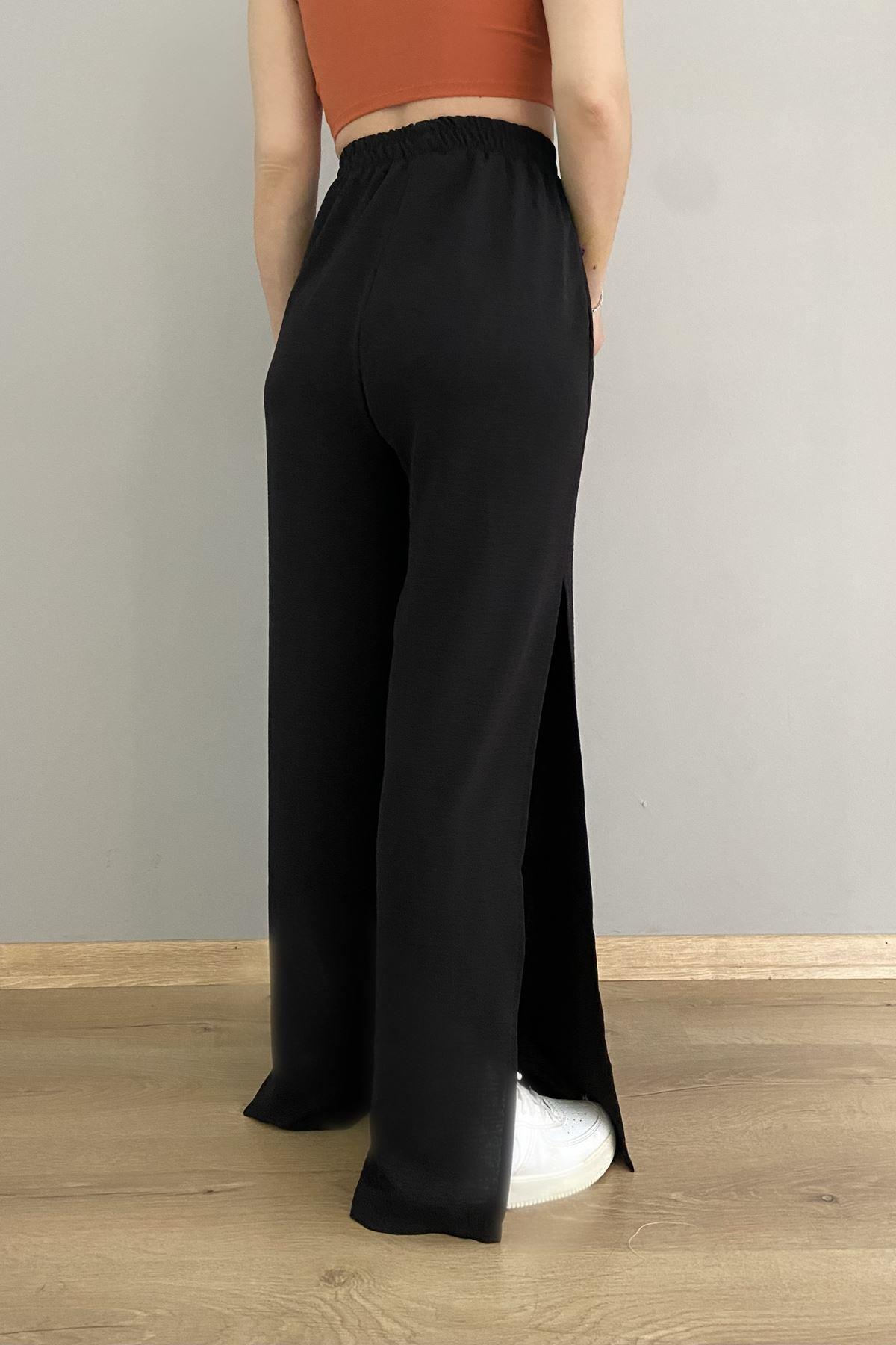 PAÇA YIRTMAÇLI BOL PANTOLON