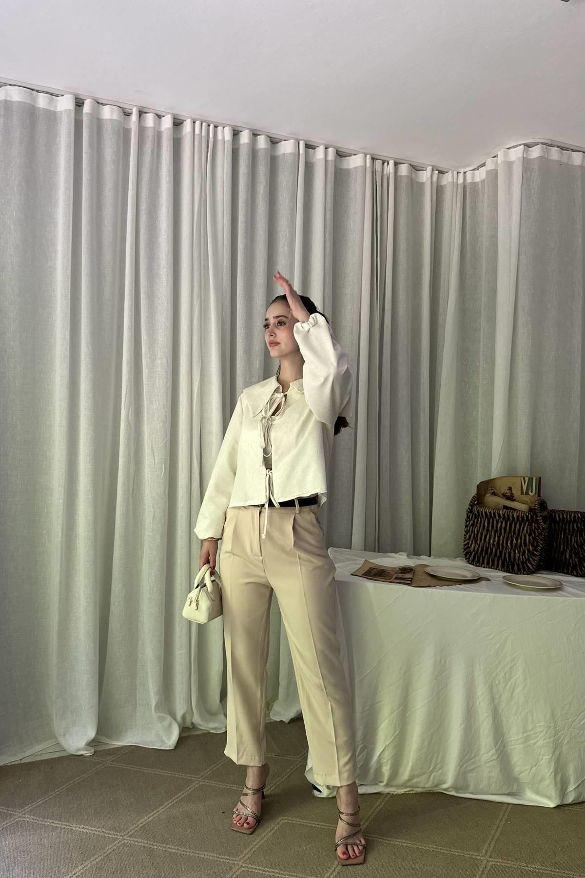 PAÇA YIRTMAÇLI KEMERLİ PANTALON