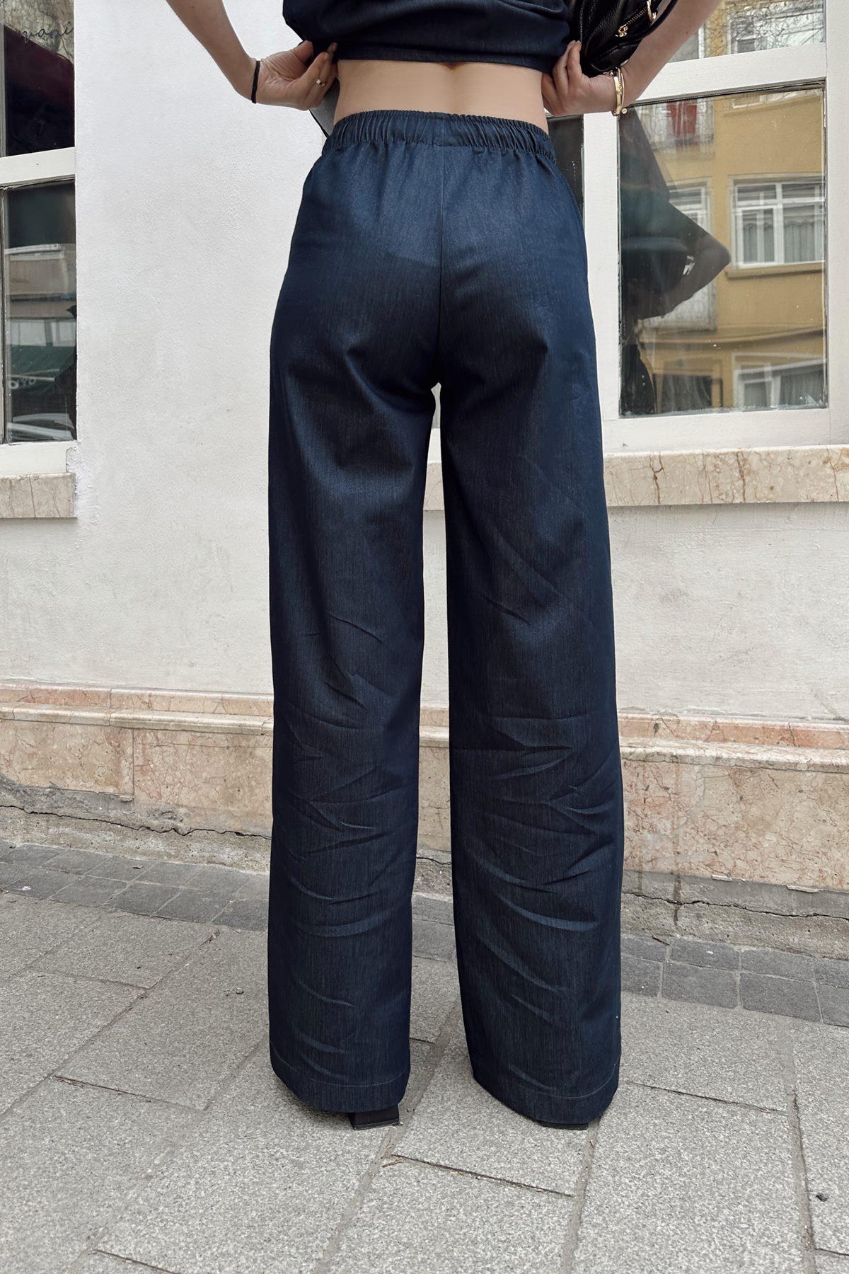 UZUN DÖKÜMLÜ ŞIK PANTOLON