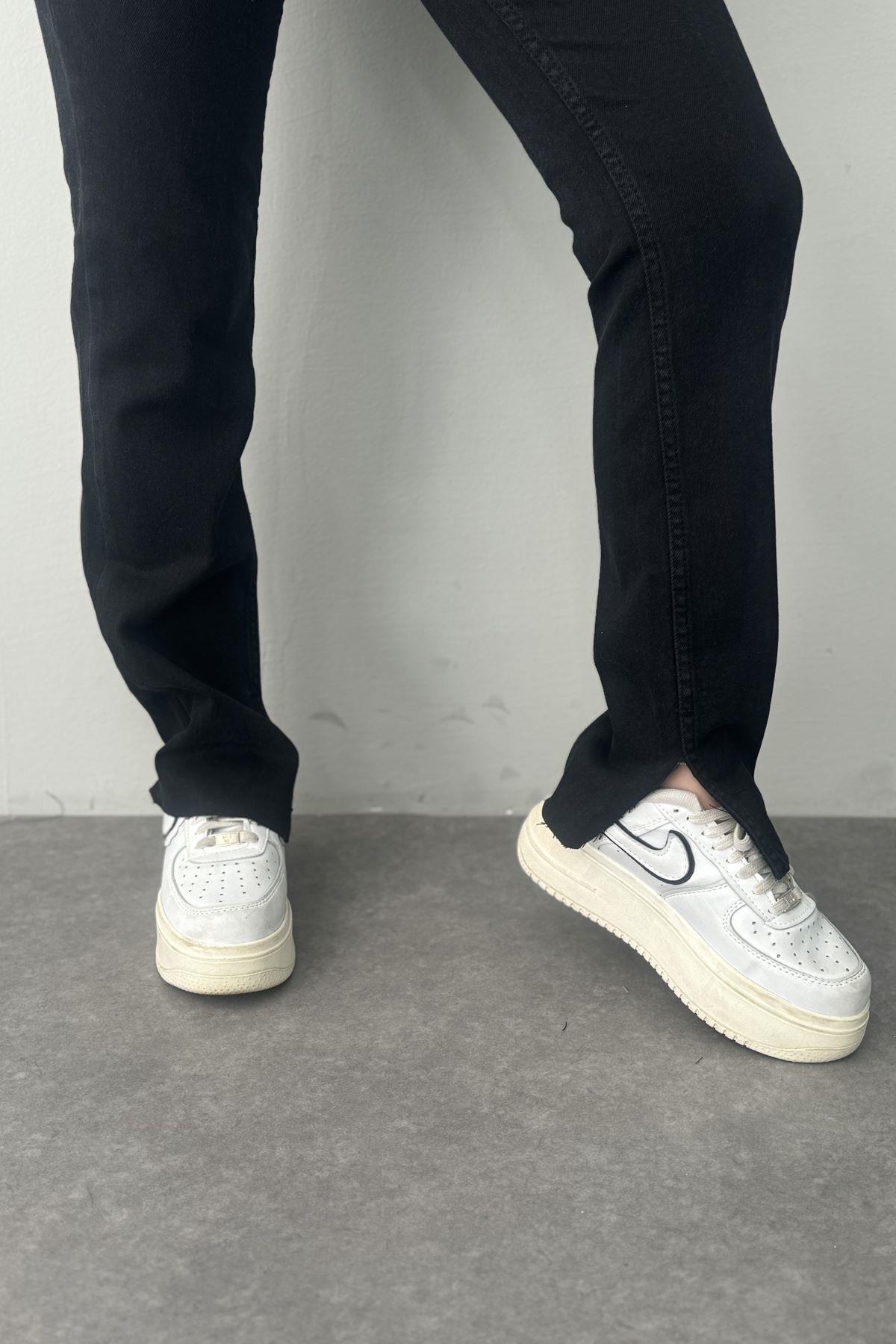 YAN YIRTMAÇLI LİKRALI PANTALON