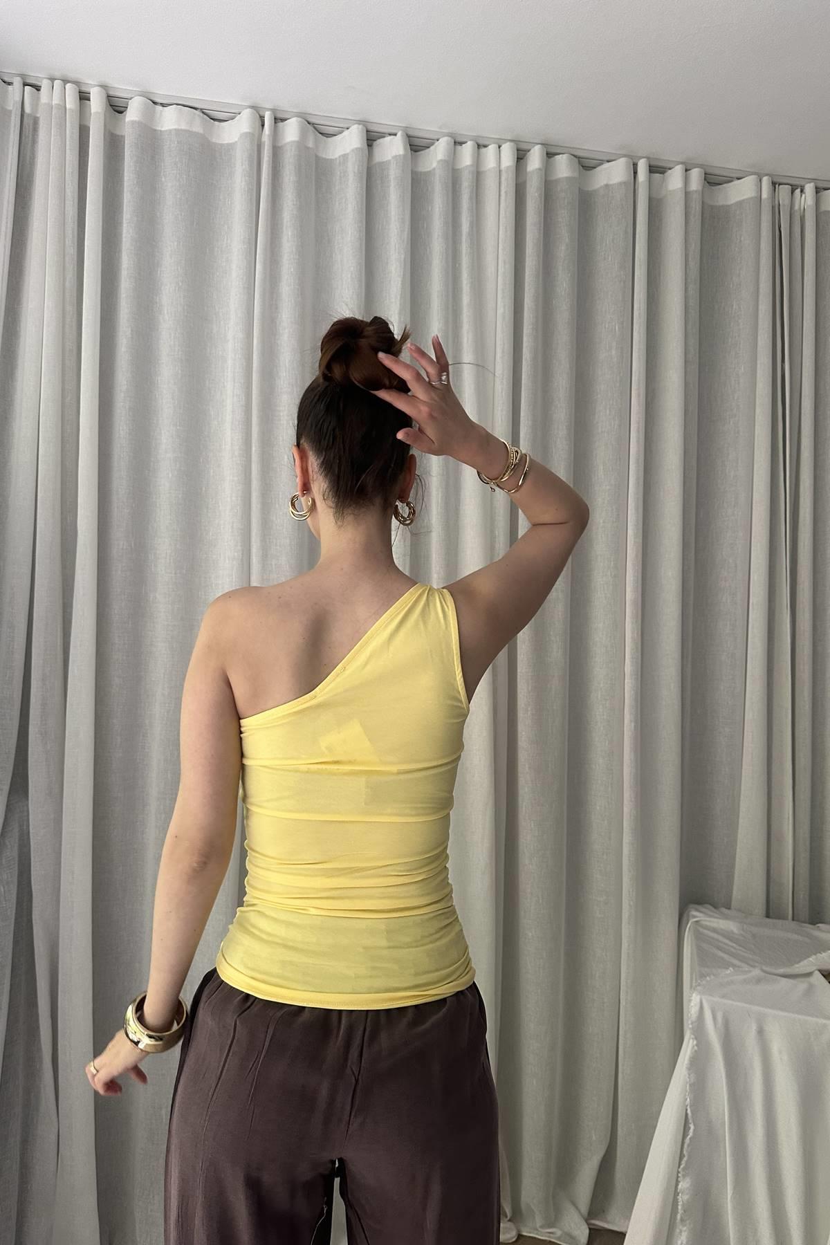 DÜĞÜM DETAYLI ASİMETRİK TOP