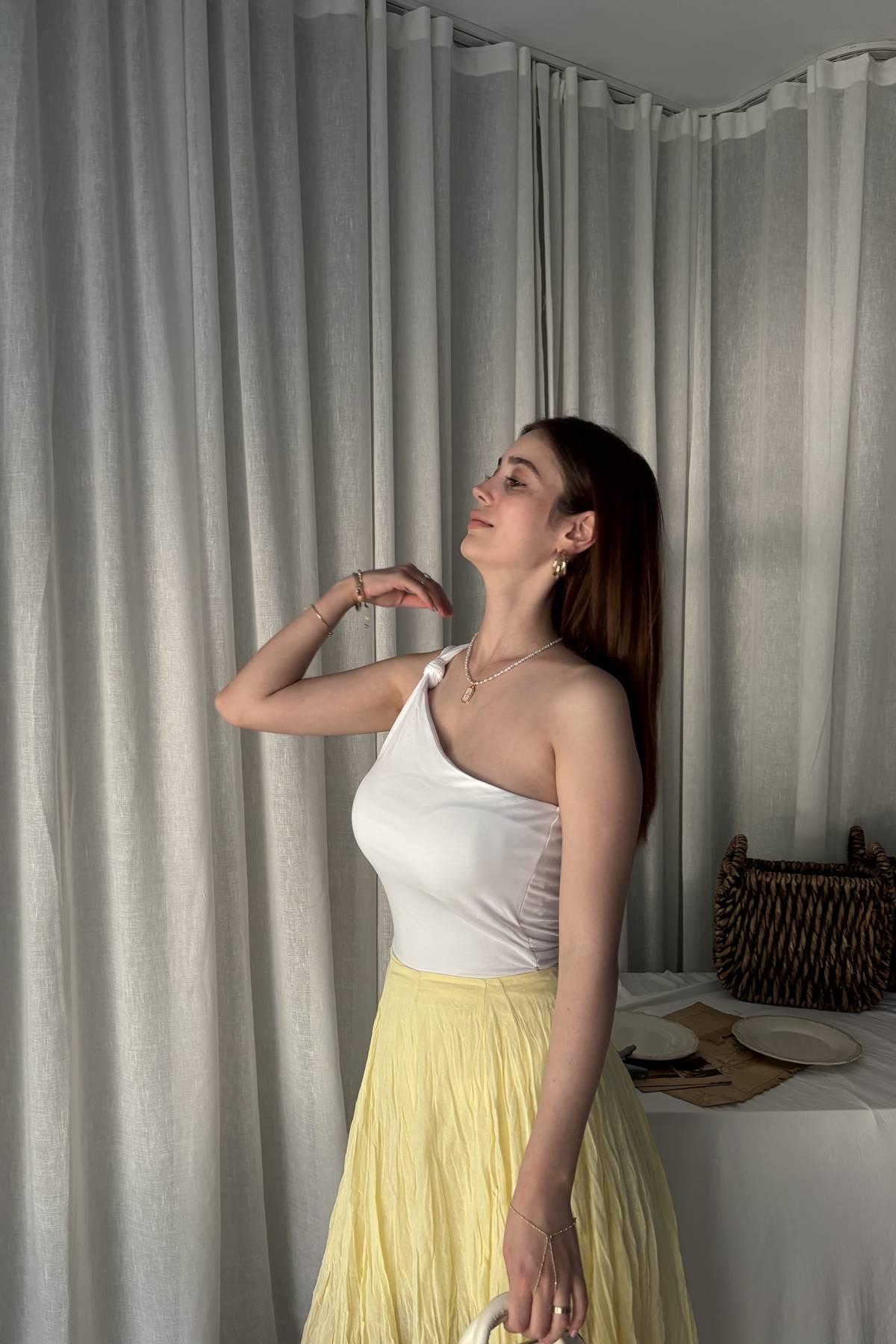 DÜĞÜM DETAYLI ASİMETRİK TOP