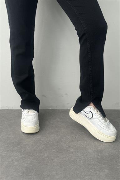 YAN YIRTMAÇLI LİKRALI PANTALON
