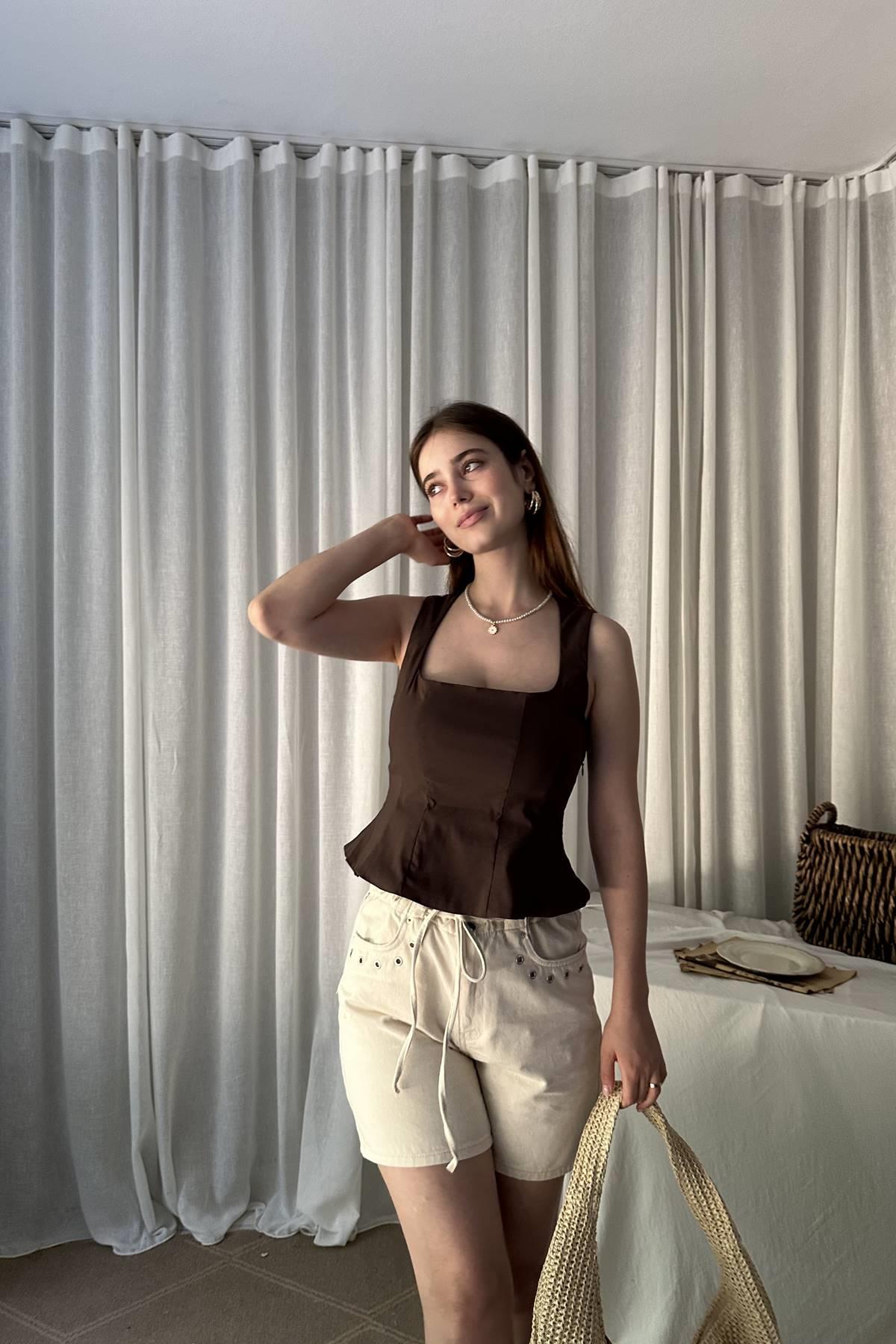 PEPLUM KORSE TOP