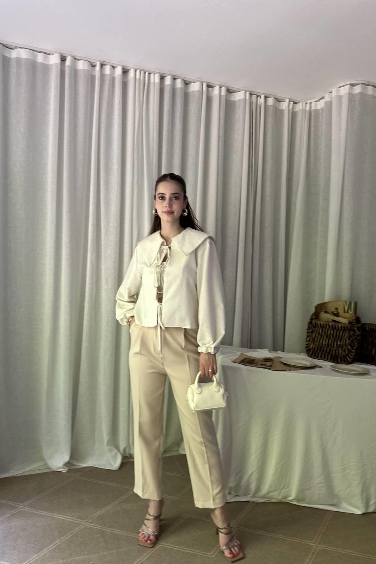 PAÇA YIRTMAÇLI KEMERLİ PANTALON