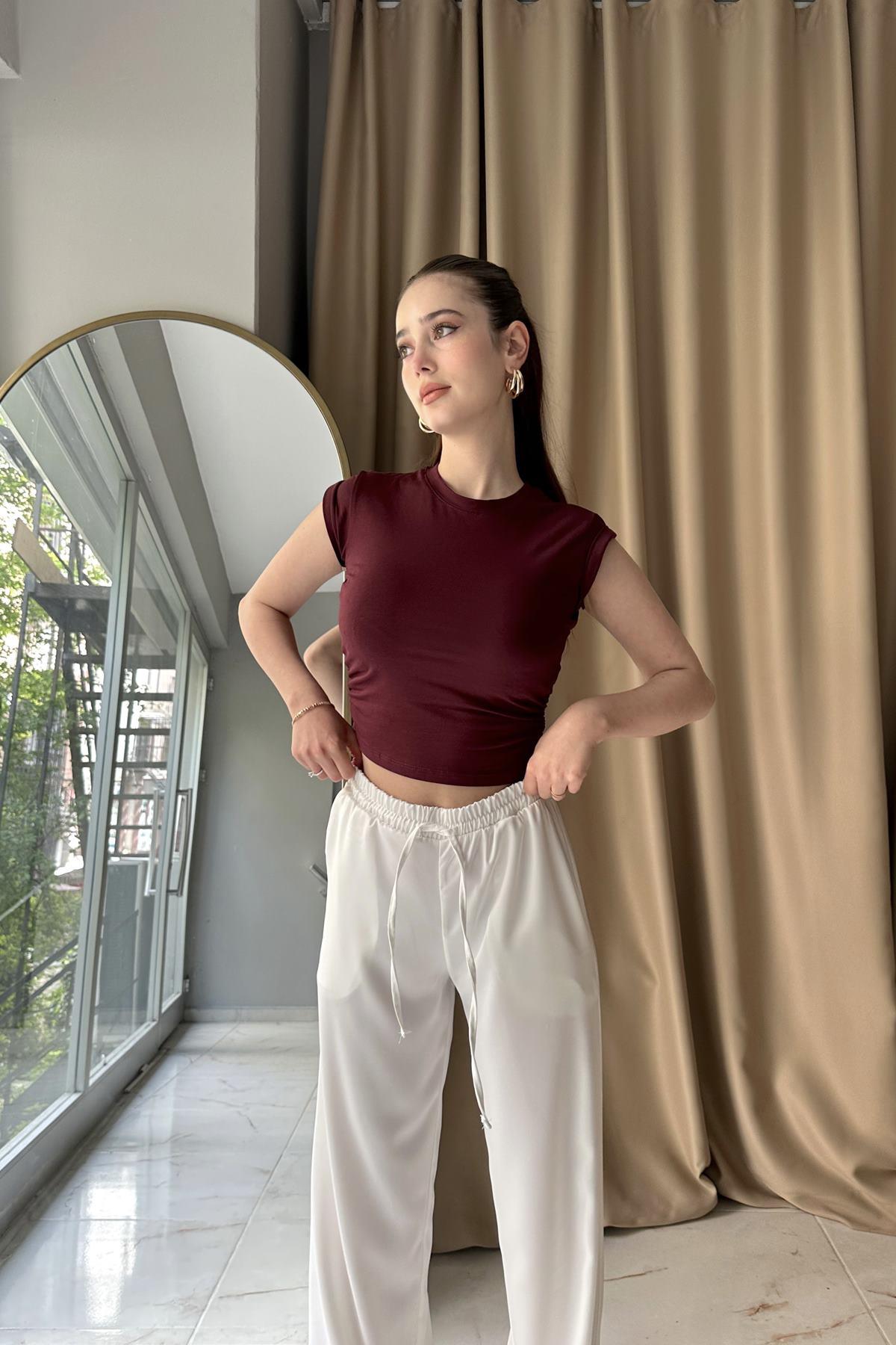 YANLARI BÜZGÜ DETAYLI TOP