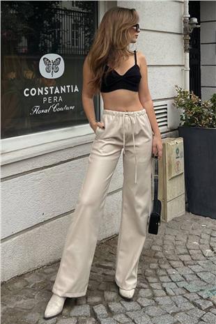 Kadın Bej Beli Lastikli Ve Bağcıklı Suni Deri Palazzo Pantolon VS01395