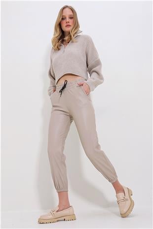Kadın Bej Çift Cepli Bel Ve Bilek Lastikli İçi Şardonlu Casual Suni Deri Pantolon ALC-X7329