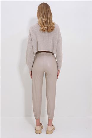 Kadın Bej Çift Cepli Bel Ve Bilek Lastikli İçi Şardonlu Casual Suni Deri Pantolon ALC-X7329