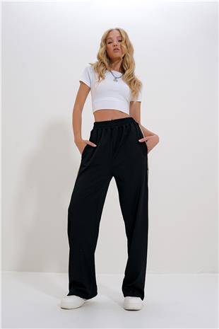 Kadın Siyah Çift Cepli Lastikli Yanları Şeritli Wide Leg Pantolon ALC-X12713