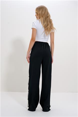 Kadın Siyah Çift Cepli Lastikli Yanları Şeritli Wide Leg Pantolon ALC-X12713