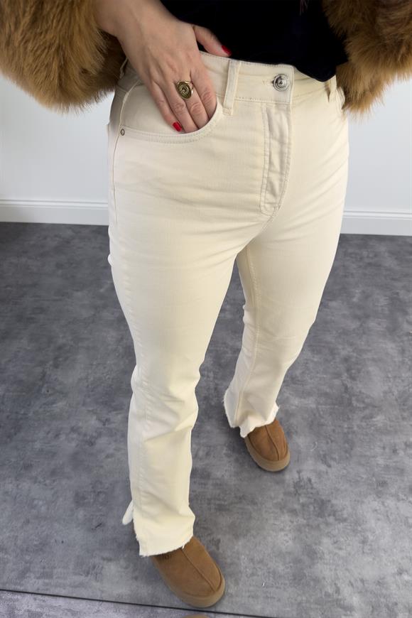 Orjinal Marka Paçası Kesik Yırtmaçlı Taş Jean