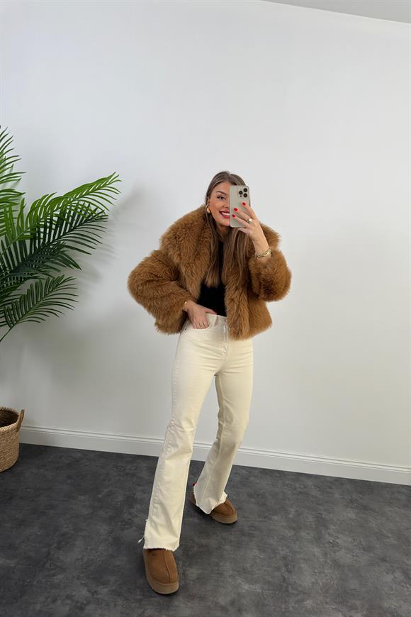 Orjinal Marka Paçası Kesik Yırtmaçlı Taş Jean