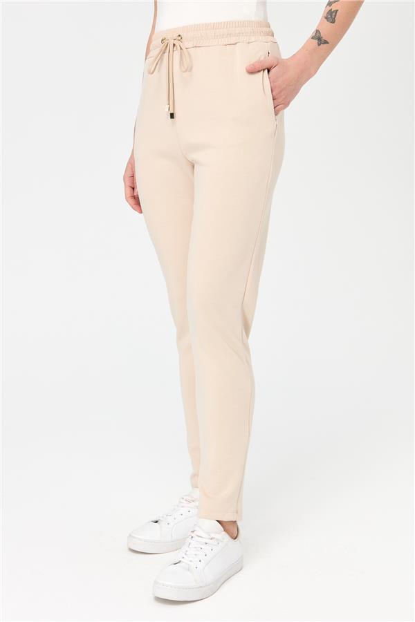 Женские спортивные брюки со шнуровкой на талии и карманами