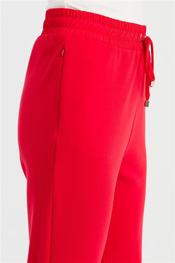 Женские спортивные брюки со шнуровкой на талии и карманами