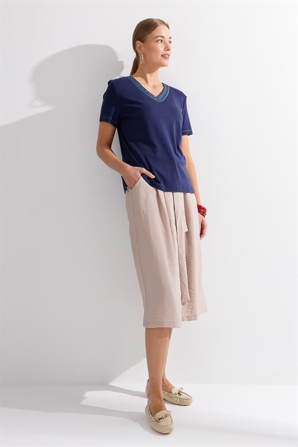 Женская юбка с поясом на пуговицах спереди