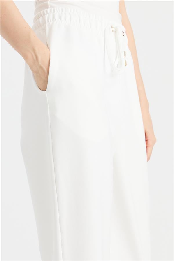 Женские спортивные брюки с карманами