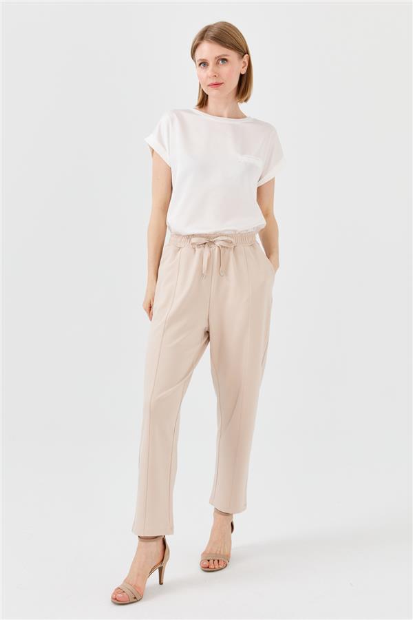 Женские брюки с карманами бежевые 
