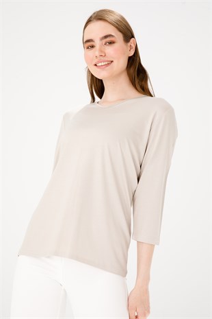 Женская трикотажная базовая блуза с V-образным вырезом и рукавом три четверти бежевого цвета