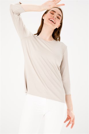 Женская трикотажная базовая блуза с V-образным вырезом и рукавом три четверти бежевого цвета
